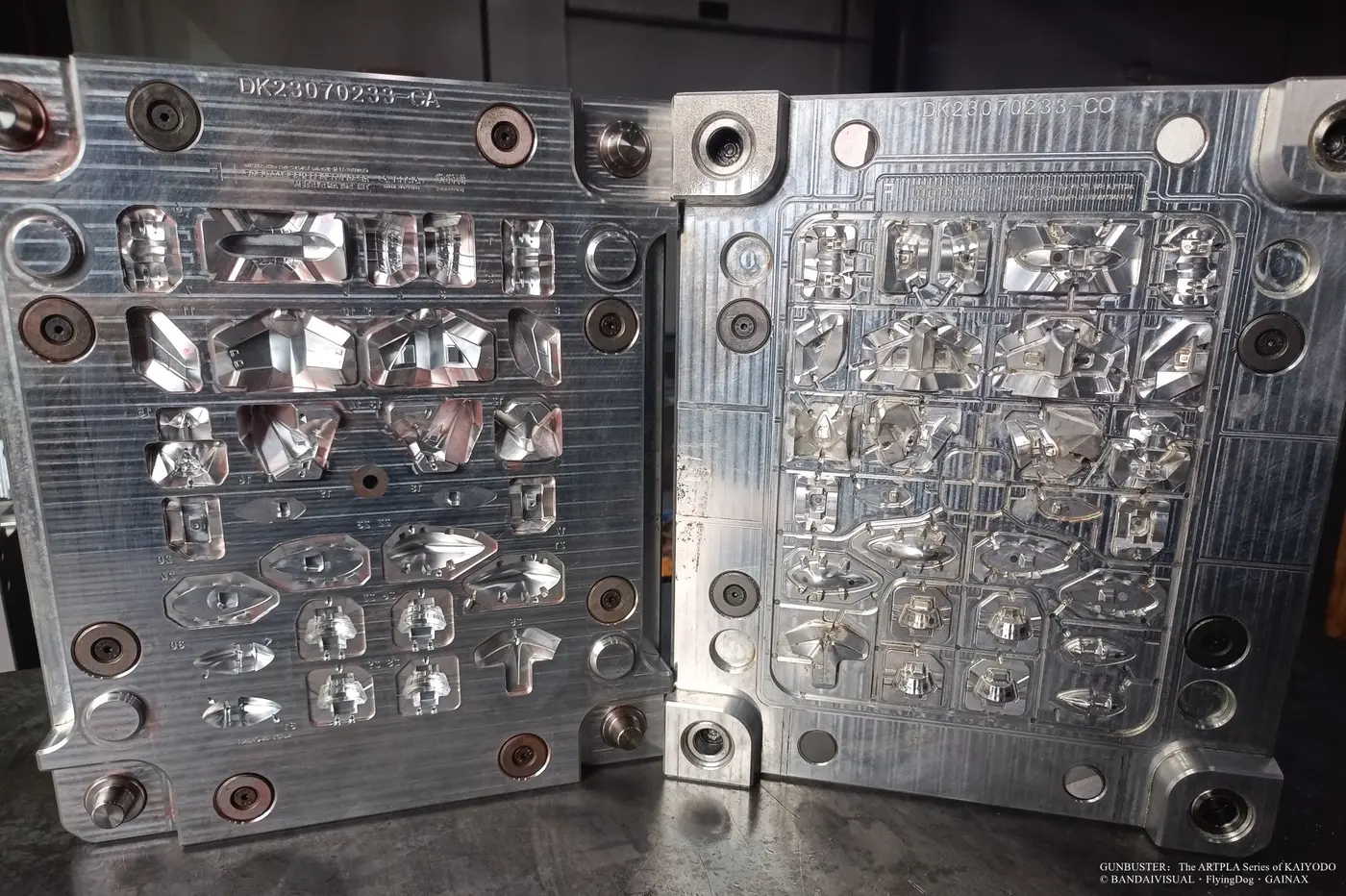 Open ARTPLA Gunbuster production tooling with detailed component cavities